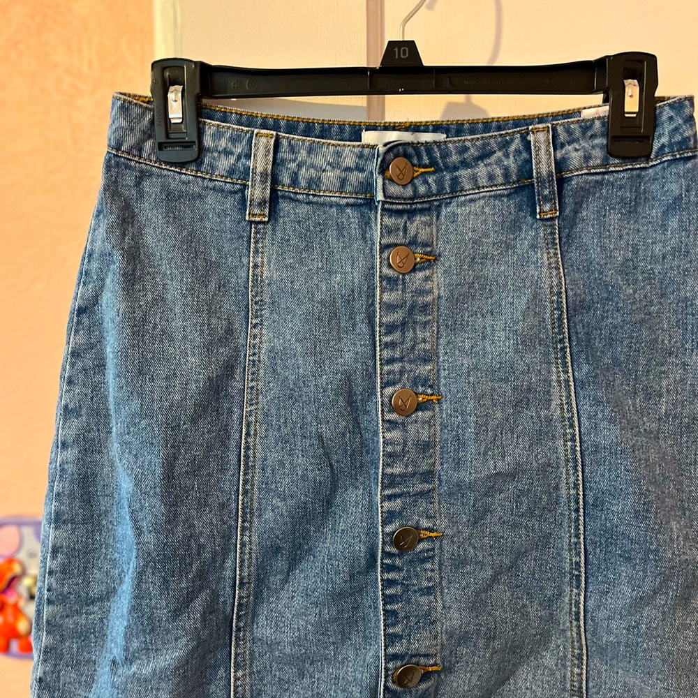 Blue denim skirt.
